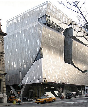 The new Cooper Union building, by architect Thom Mayne. Is that a distortion
in the photo, or is the building to the left shrinking back?
(Image source)