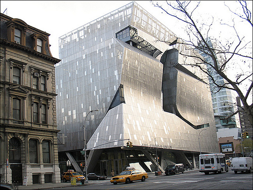 The new Cooper Union building, by architect Thom Mayne. Is that a distortion
in the photo, or is the building to the left shrinking back?
(Image source)