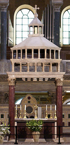 The ciborium at San Lorenzo Fuori le Mura, Rome. (The bishop's cosmatesque
cathedra is visible behind the altar.)
(Image source)