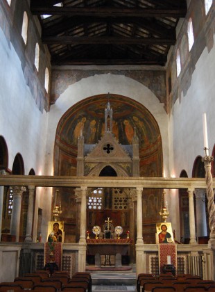 A view from the choir looking toward the sanctuary at Santa Maria in Cosmedin, Rome. Columns and entablature atop the low wall, or templon, mark the boundary of the sanctuary. In antiquity, curtains hung between the columns
[Image source]