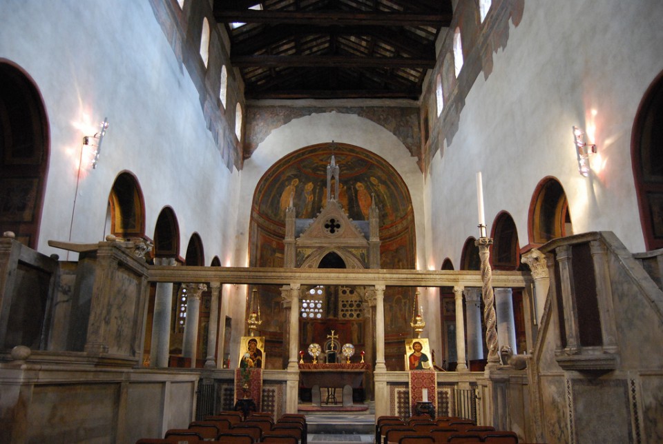 A view from the choir looking toward the sanctuary at Santa Maria in Cosmedin, Rome. Columns and entablature atop the low wall, or templon, mark the boundary of the sanctuary. In antiquity, curtains hung between the columns
[Image source]