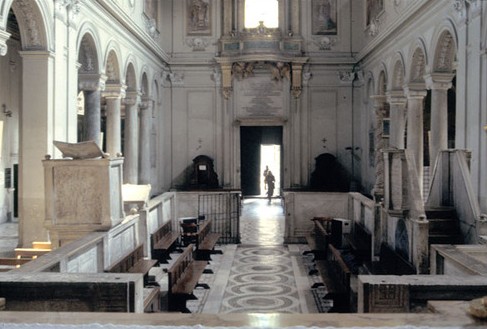 View from the high altar looking toward the east (as Mass ad orientem would be said).
Note the Gospel ambo is to the south (right), so as to be situated to the bishop’s right hand. The Gospel would have been read, then, facing left, which is north. The columns flanking the nave are ancient spolia, only the capitals having been refashioned by Fontana.
