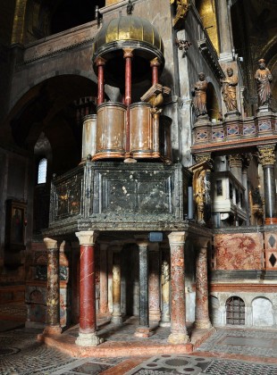 The ambo at St. Mark's Basilica, Venice. I hope the lower level is not normally used to store folding chairs.
[Image Source]